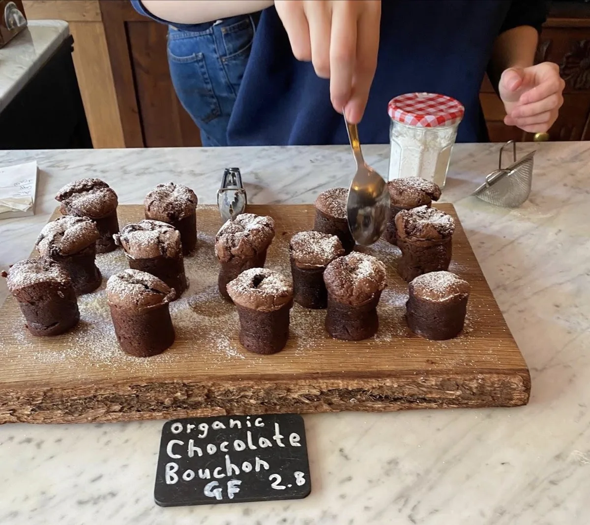 Chocolate bouchon cakes dusted with icing sugar